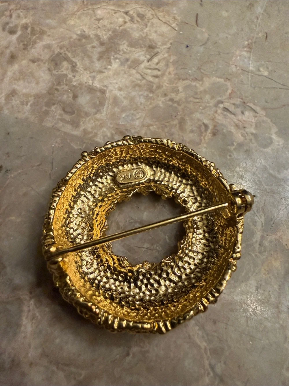 Vintage Anne Klein Circle brooch with texture gold tone